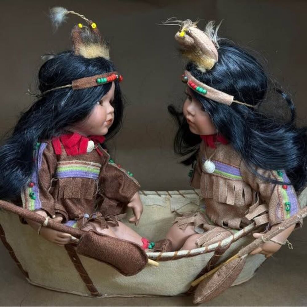 Cathay Collection Native American-Inspired Porcelain Dolls in Canoe 1 of 5000